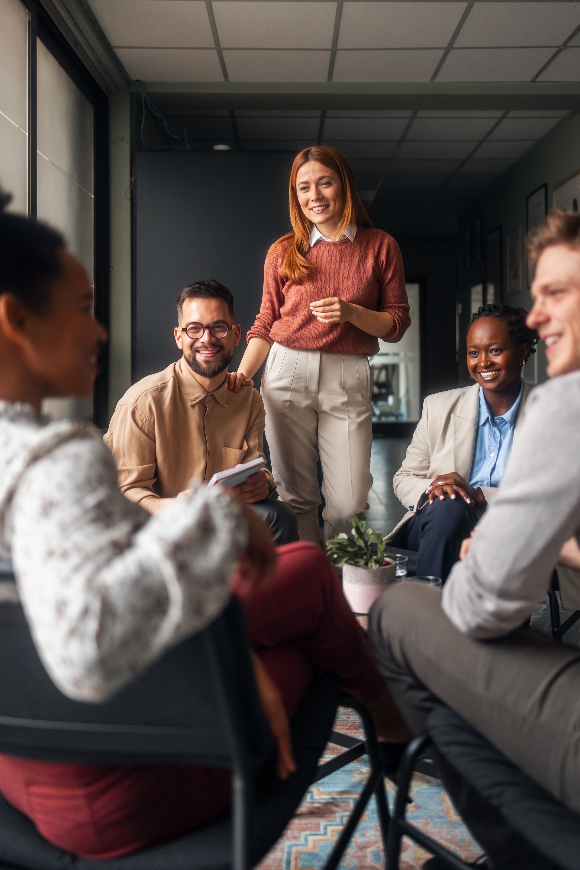 Diverse Team Collaborating During a Casual Office Meeting
